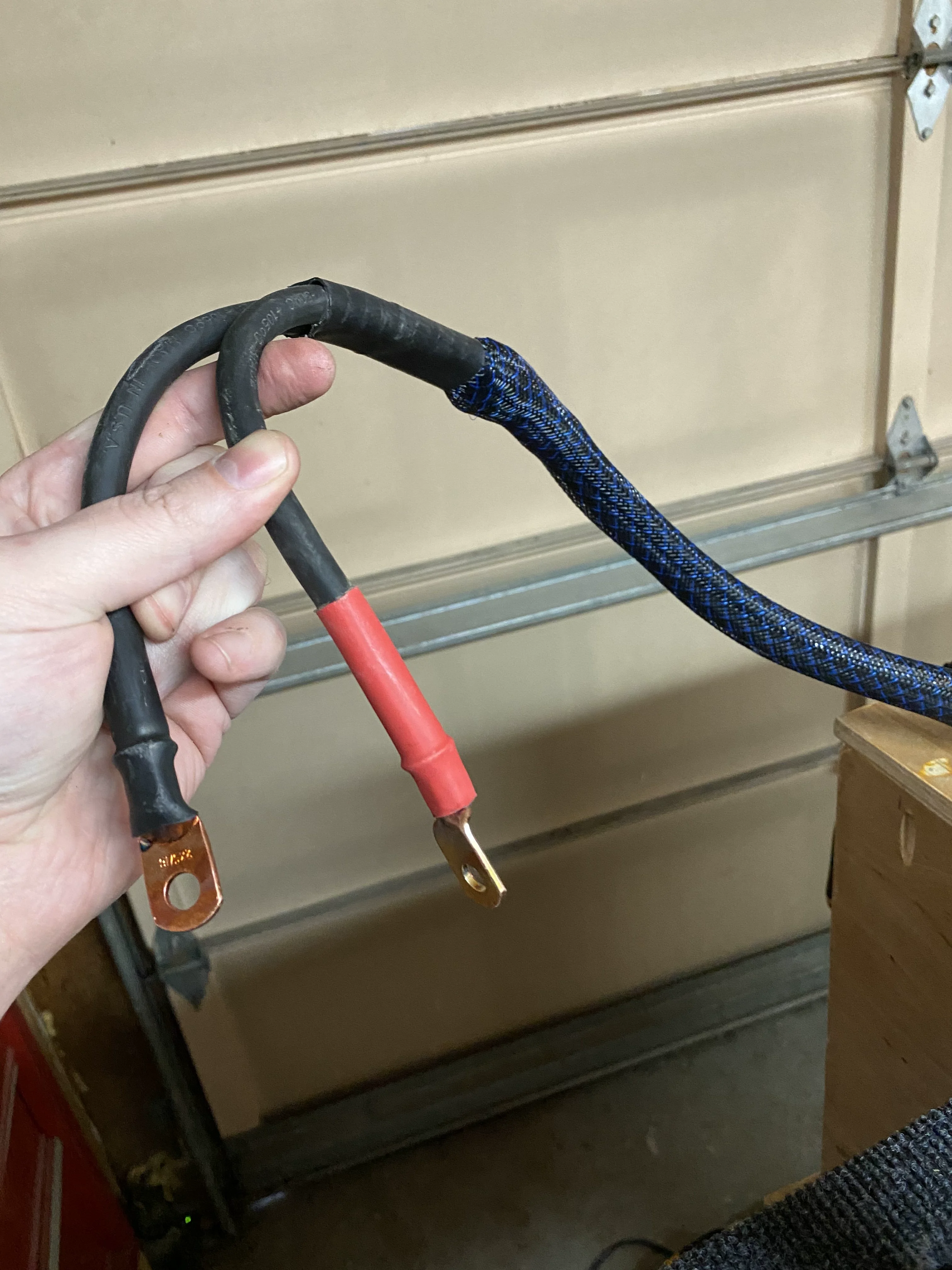 Welding wire cables in protective loom material