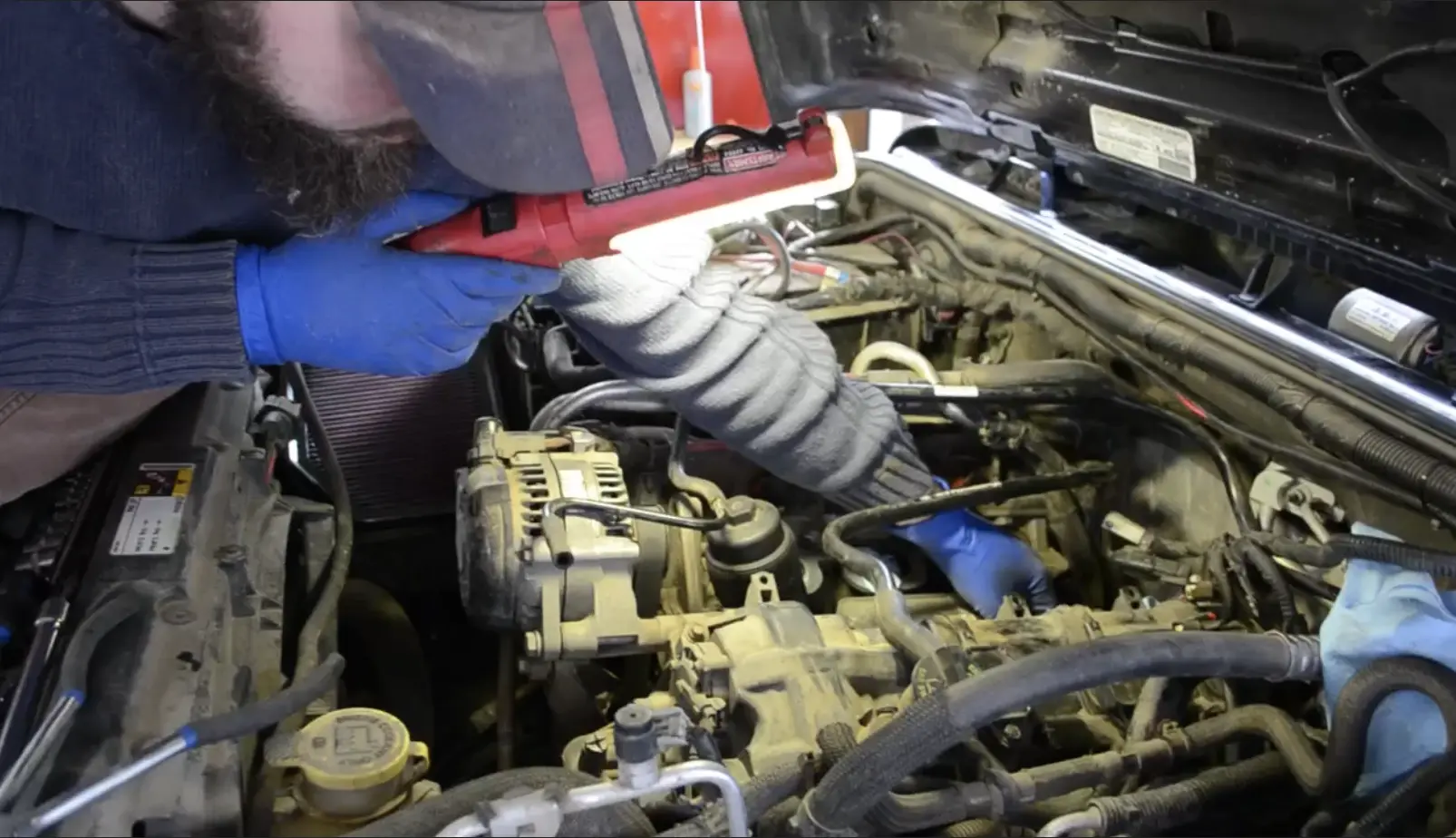 Working on Ruby's transmission issues in our tiny garage